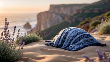 Relaxing Beach Blanket on Sand Dunes with Coastal Cliff View photo
