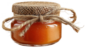 Glass jar of peach preserves with burlap lid and rustic twine on transparent background png