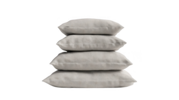 Four soft light grey cushions stacked on transparent background png