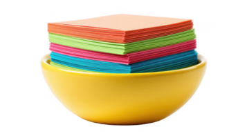 Stack of colorful sticky notes resting in a bright yellow bowl on a transparent background png