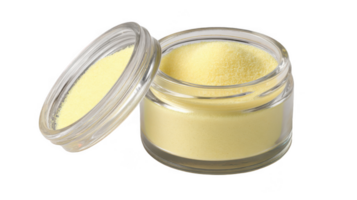 Small open jar containing yellow paste like filler on transparent background png