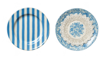Two empty plates with blue patterns and white lace doily on transparent background png