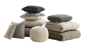 Soft textiles, pillows, knitted pouf, and blankets arranged on transparent background png