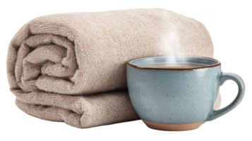 Steaming mug and folded blanket creating cozy atmosphere on transparent background png