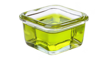 Light green vinaigrette dressing in square glass container with transparent background png