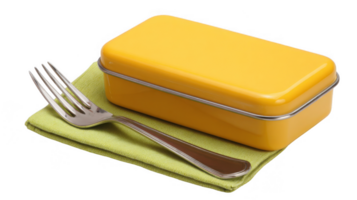 Yellow lunch box with fork resting on green napkin on transparent background png