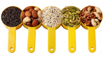 Measuring cups containing chia seeds, nuts, amaranth, and cardamom pods on transparent background png