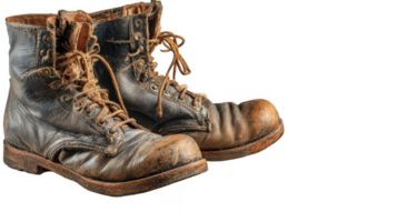 Old leather work boots isolated on transparent background showing signs of wear and tear png