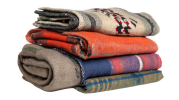 Stack of folded blankets on transparent background png