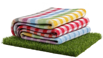 Colorful picnic blankets folded on grass with transparent background png