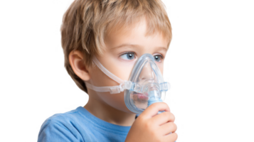 Child using inhaler mask for respiratory therapy on transparent background png