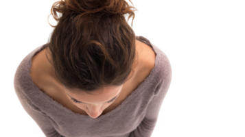 Woman looking down with transparent background, sadness and introspection png