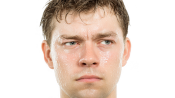 Young man sweating profusely with transparent background png