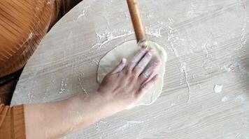 Rolling Dough With Care While Preparing Traditional Gozleme in a Cozy Kitchen Setting video