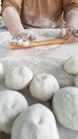 Mastering the Art of Dough With Skilled Hands in a Cozy Kitchen Setting video