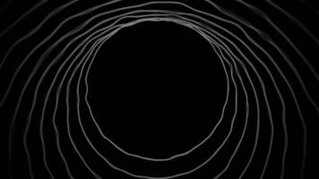 Abstract concentric circles expanding and contracting on black background. Motion video