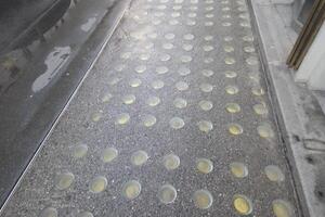 Urban Safety Design Featuring Tactile Paving for Accessibility and Pedestrian Guidance photo