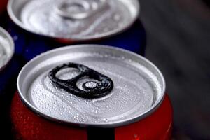 Cold canned soft drinks with sugar photo