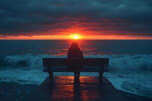 Solitude and Reflection at Sunset by the Sea - Serene Oceanfront Moment for Mindful Inspiration photo