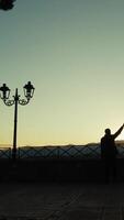 Silhouette Of A Man Indicates The Places Visible From Overlooking The Sunset Outdoor video