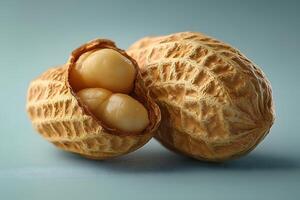 Close-Up of Whole Peanut with Shell on Blue Background for Food Design photo