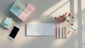 A desk with a keyboard, phone, and other items photo