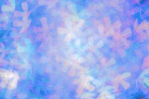 Colorful blue violet figured Bokeh Lights as Soft Pastel Background, Abstract bokeh background, natural flare from lights, blurred texture as holiday backdrop, celebration idea with optical effect photo