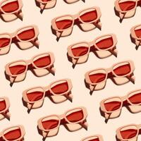 Minimal pattern of Stylish sunglasses with pink Frame on peach beige color background, sunlight shadow, summer fashion plastic-framed glasses. Aesthetic top view eyewear, geometric patterns photo