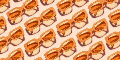 Minimal pattern of Stylish sunglasses with Yellow Frame on peach background, sunlight shadow, summer plastic-framed glasses. Aesthetic banner with eyeglasses, linear style fashion eyewear photo