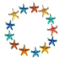Round frame from colorful with colorful sea stars. Happy, bright and summer mood flat lay. photo