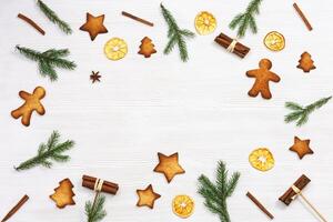 Baked Christmas ginger biscuits, traditional shapes, xmas sweet food background. Handmade cookies photo