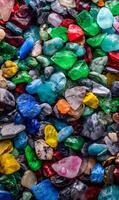 Vibrant assortment of polished gemstones creating a mesmerizing mosaic of color and texture for background photo