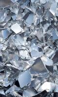 Pile of Shiny Silver Flakes Reflecting Light Creates a Modern Abstract Texture and Pattern Concept photo