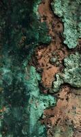 Verdigris abstract pattern on copper surface showcasing textures, colors, and corroded formations for artistic designs or backgrounds photo