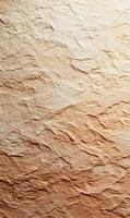 Earthy texture with variations in shade showcasing the rough surface of sandstone or rock formation for use as background photo
