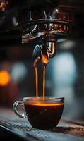 Espresso extraction creating a rich coffee in a glass cup with beautiful depth of field lighting in the background photo