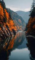 Autumnal serenity reflective river scene surrounded by vibrant fall foliage and distant mountain views beauty nature photo