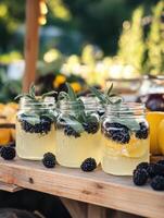 Rustic Market Setting with Blackberry Sage Infused Lemonade Served photo