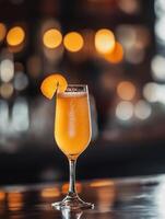 Sophisticated Peach Bellini Brunch Cocktail for Summer photo