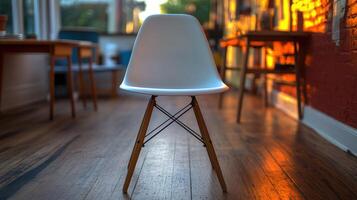 White chair on wooden floor in home photo