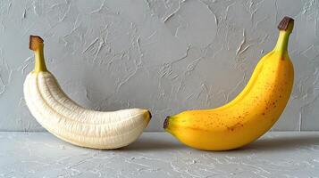 Two Bananas, One Ripe, One Unripe photo