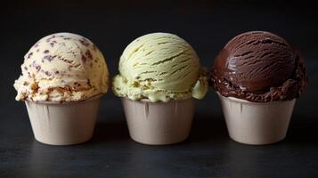 Three scoops of ice cream in craft paper cups photo