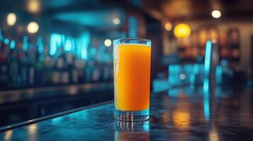 Orange cocktail on bar photo