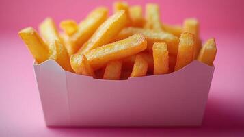Golden French Fries in Pink Box photo