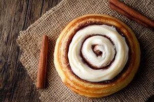 Cinnamon Roll With Cream Cheese Frosting, Copy Space, Food Image photo