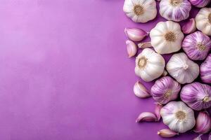 Top view Garlic on a vibrant background, plant setting photo