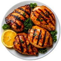 Grilled Chicken Breast on White Plate with Fresh Herbs and Lemon Slice png