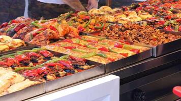 Colorful array of grilled dishes at local market video