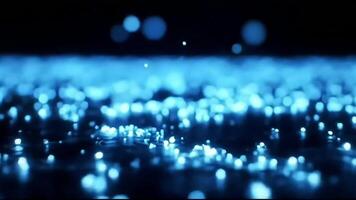 Blue lights are shining on a black surface video