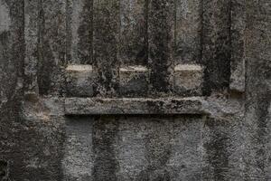 The design of an old, shabby, dirty column. The column in close-up photo